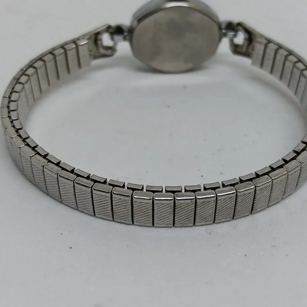 VINTAGE Timex 348 Manual Wind Women's 17mm Silver Tone Flex Band Watch
